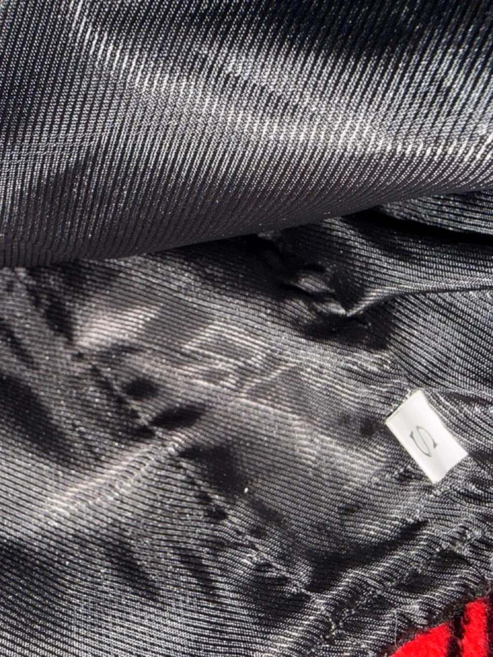 Pearl-Accent Black Midi Skirt with Front Slit